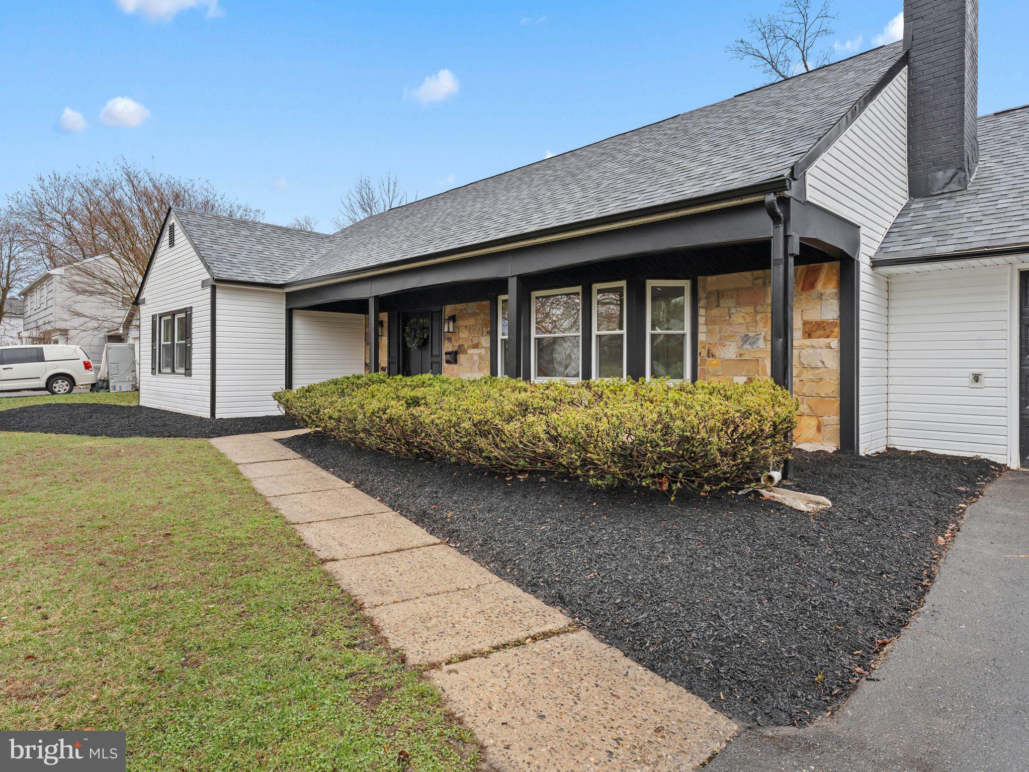 50 Tweedstone Lane Willingboro, NJ 08046 - Photo 3 of 45 a front view of a house with garden