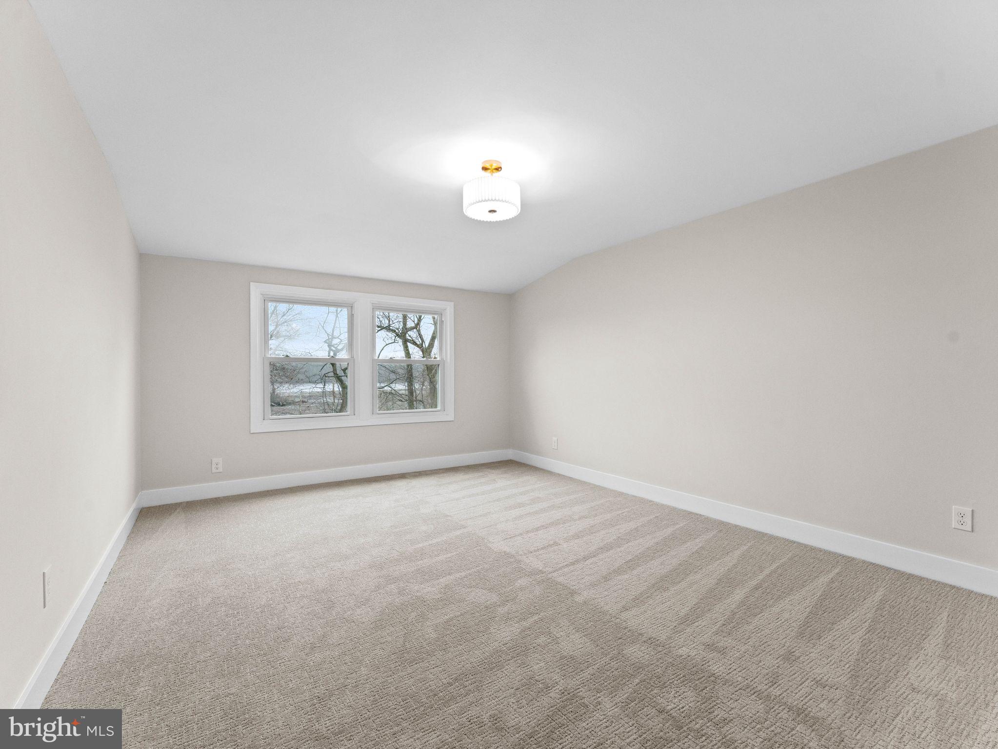 50 Tweedstone Lane Willingboro, NJ 08046 - Photo 31 of 45 an empty room with windows and mirror