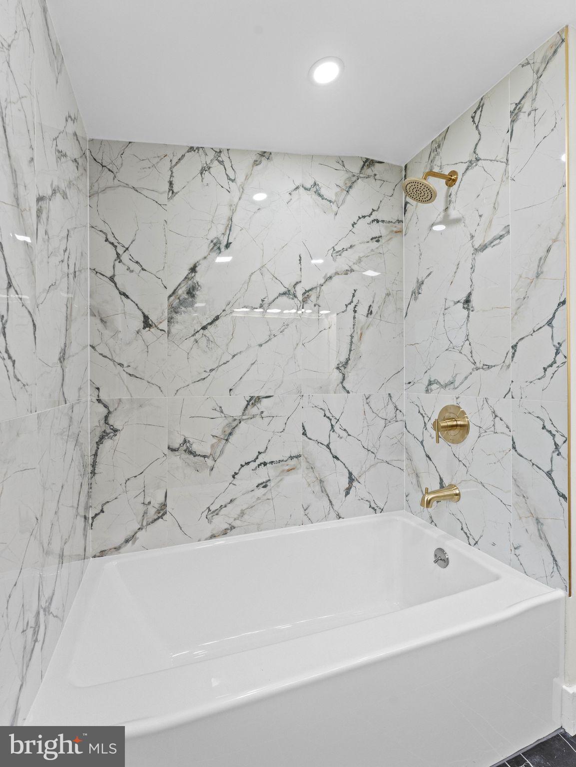 50 Tweedstone Lane Willingboro, NJ 08046 - Photo 35 of 45 a bathroom with a bathtub and shower