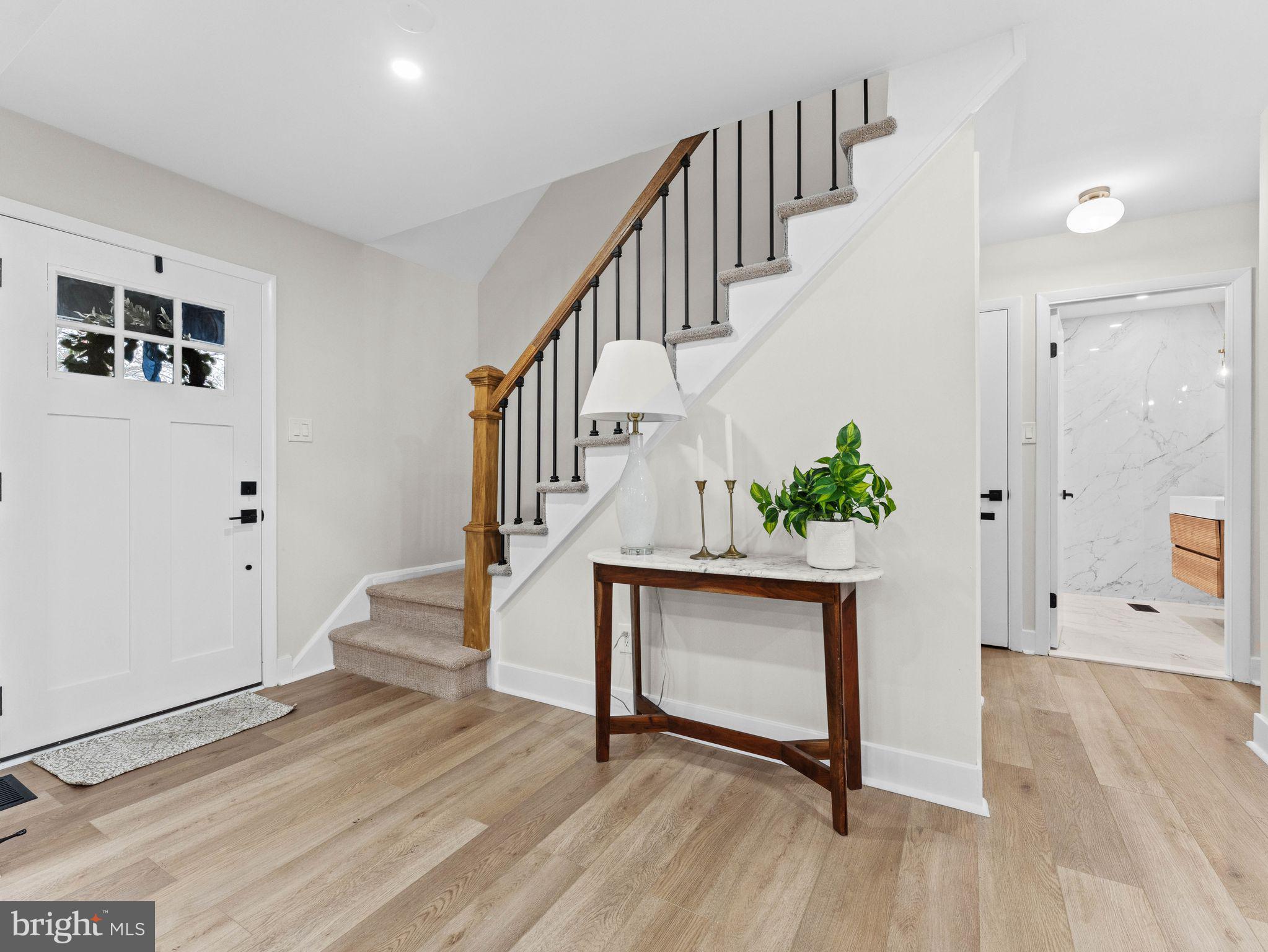 50 Tweedstone Lane Willingboro, NJ 08046 - Photo 5 of 45 a view of entryway with wooden floor and stairs