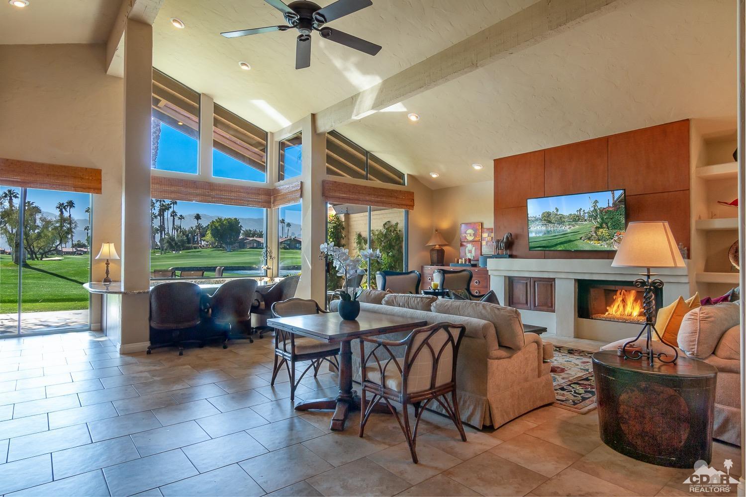 353 Red River Road Palm Desert, CA 92211 - Photo 4 of 28 a view of a dining room with furniture window and outside view