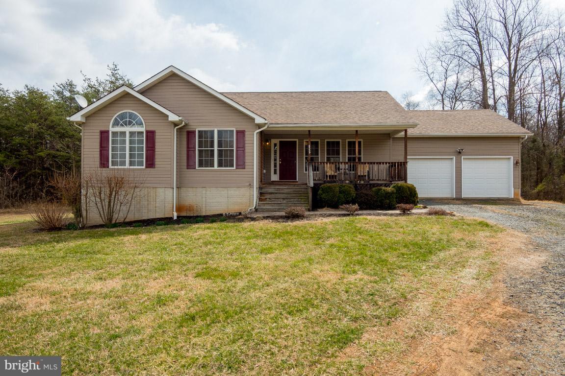 8339 Kines Road Warrenton, VA 20187 - Photo 1 of 19 a front view of a house with a yard