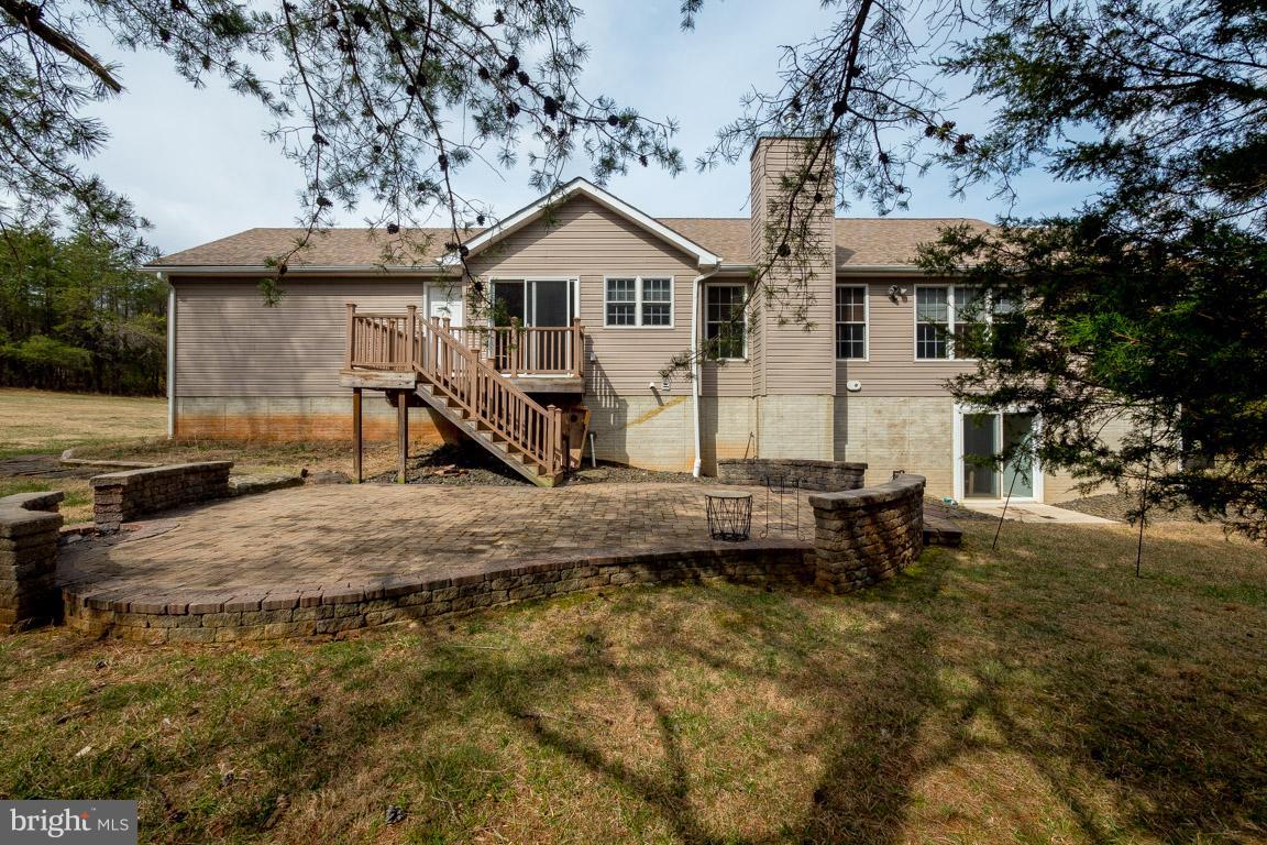 8339 Kines Road Warrenton, VA 20187 - Photo 14 of 19 a front view of a house with a yard