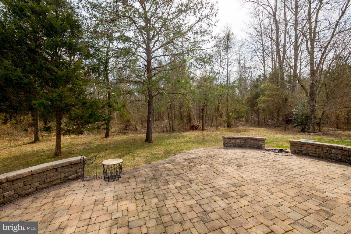 8339 Kines Road Warrenton, VA 20187 - Photo 19 of 19 a view of a yard with swimming pool and sitting area