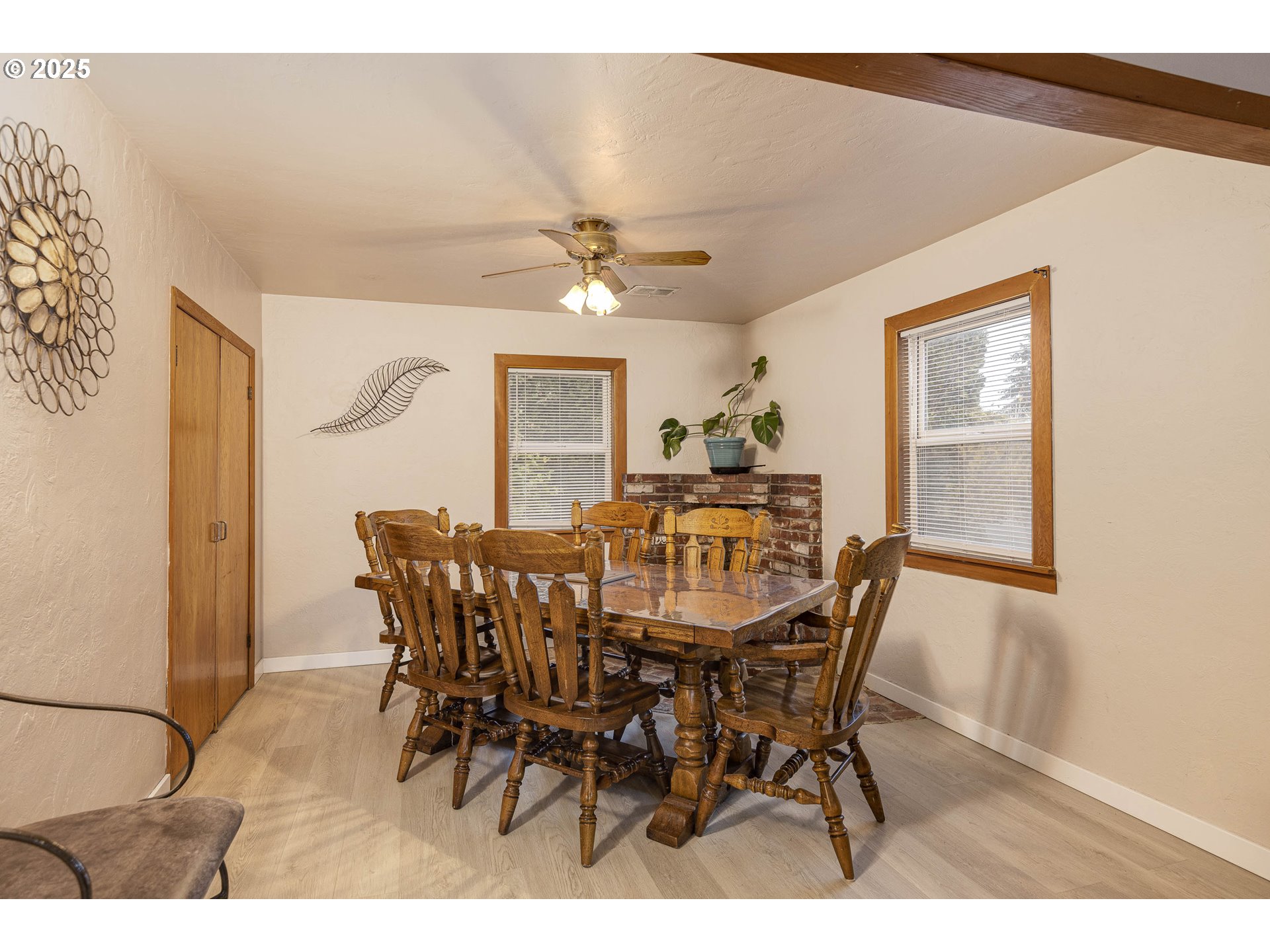 4911 15th Avenue North Keizer, OR 97303 - Photo 12 of 32 a view of a dining room with furniture and a chandelier
