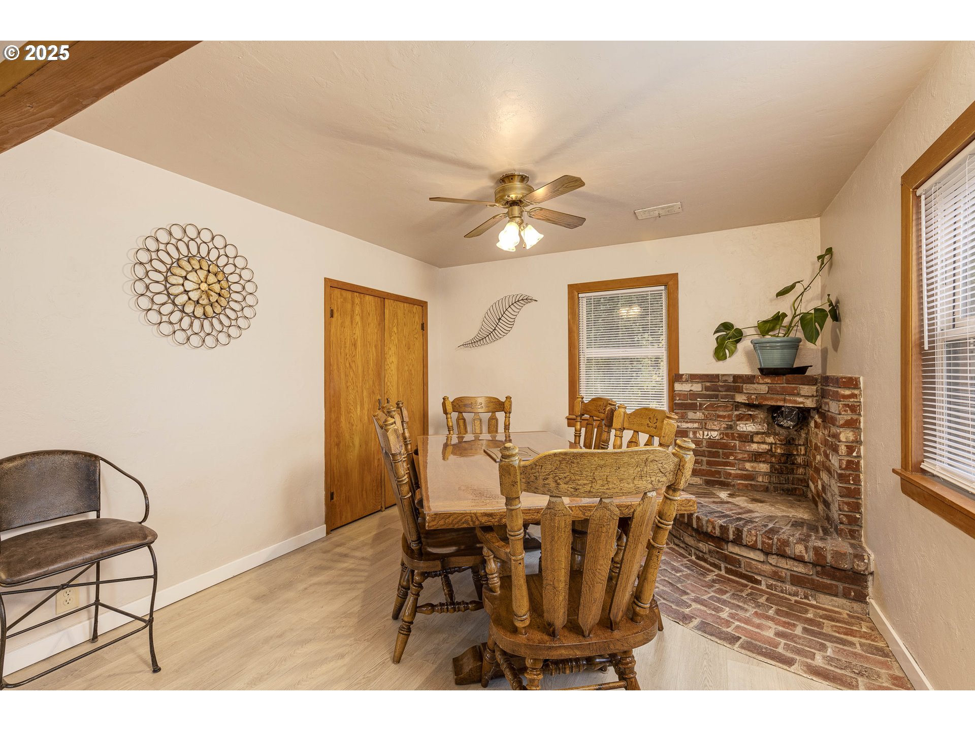 4911 15th Avenue North Keizer, OR 97303 - Photo 13 of 32 a view of a dining room with furniture and chandelier
