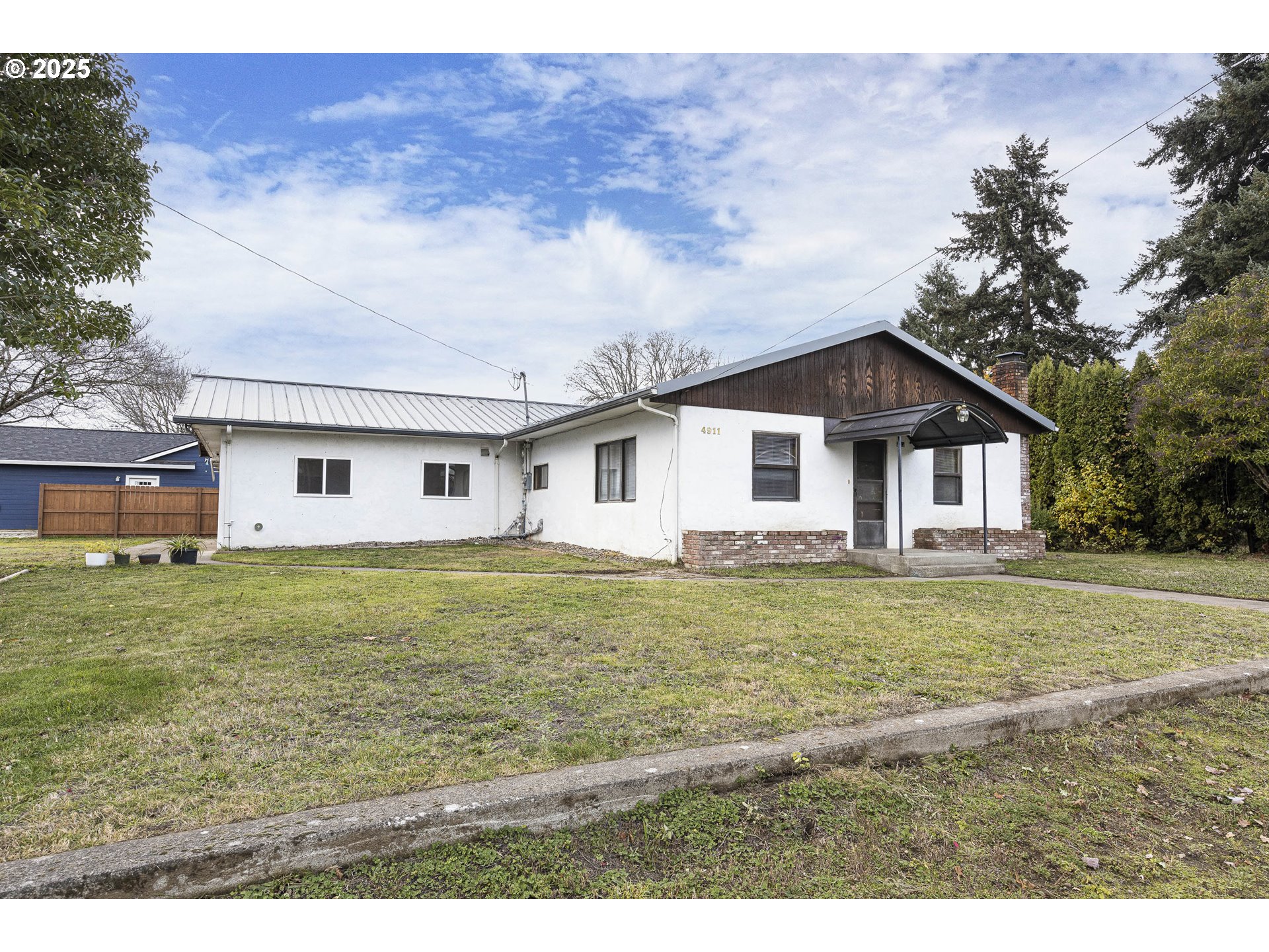 4911 15th Avenue North Keizer, OR 97303 - Photo 2 of 32 a front view of a house with a yard