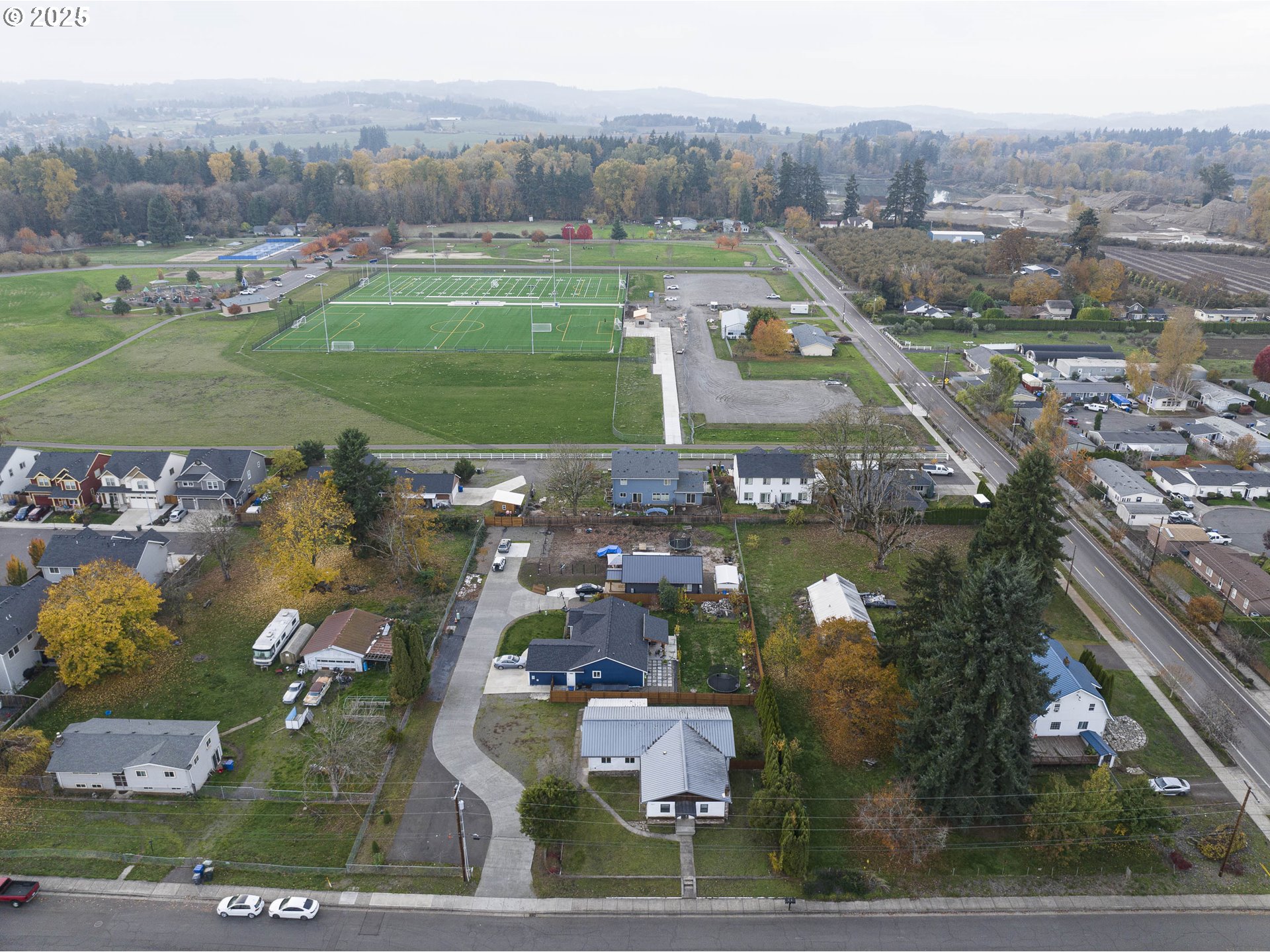 4911 15th Avenue North Keizer, OR 97303 - Photo 27 of 32 an aerial view of a houses with a yard