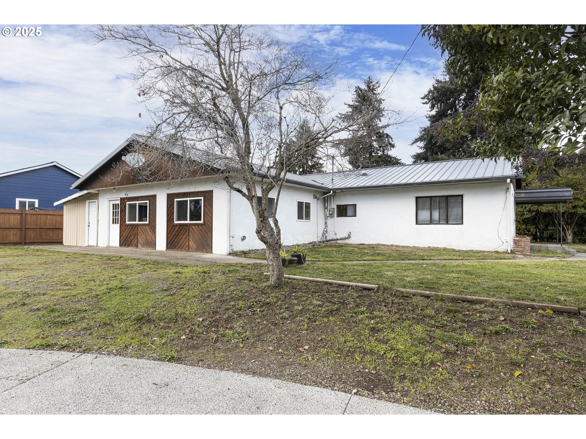 4911 15th Avenue North Keizer, OR 97303 - Photo 3 of 32 a house view with a garden space