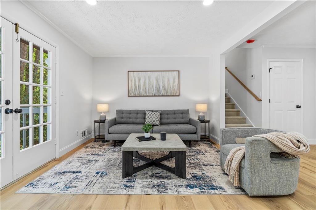 a living room with furniture and a window