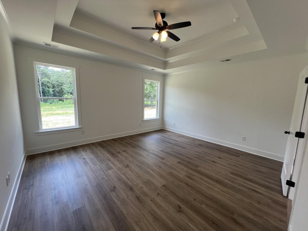 144 Tomahawk Trail Good Hope, GA 30641 - Photo 15 of 51 wooden floor in an empty room with a window