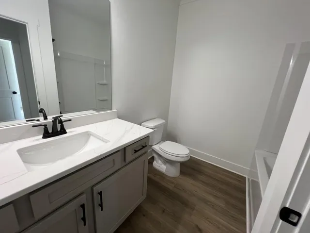 a bathroom with a sink and a toilet