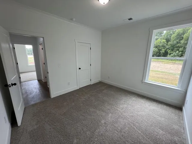 wooden floor and window in a room