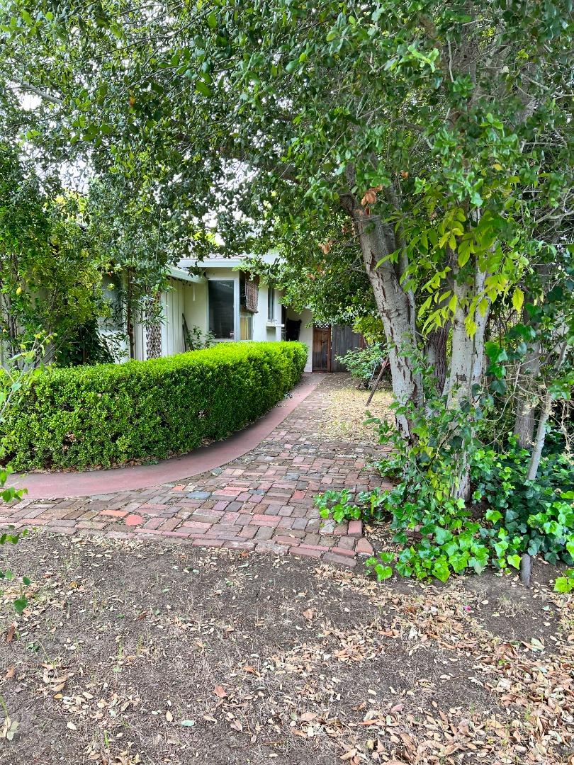 1303 Gilmore Street Mountain View, CA 94040 - Photo 12 of 12 a front view of a house with a garden