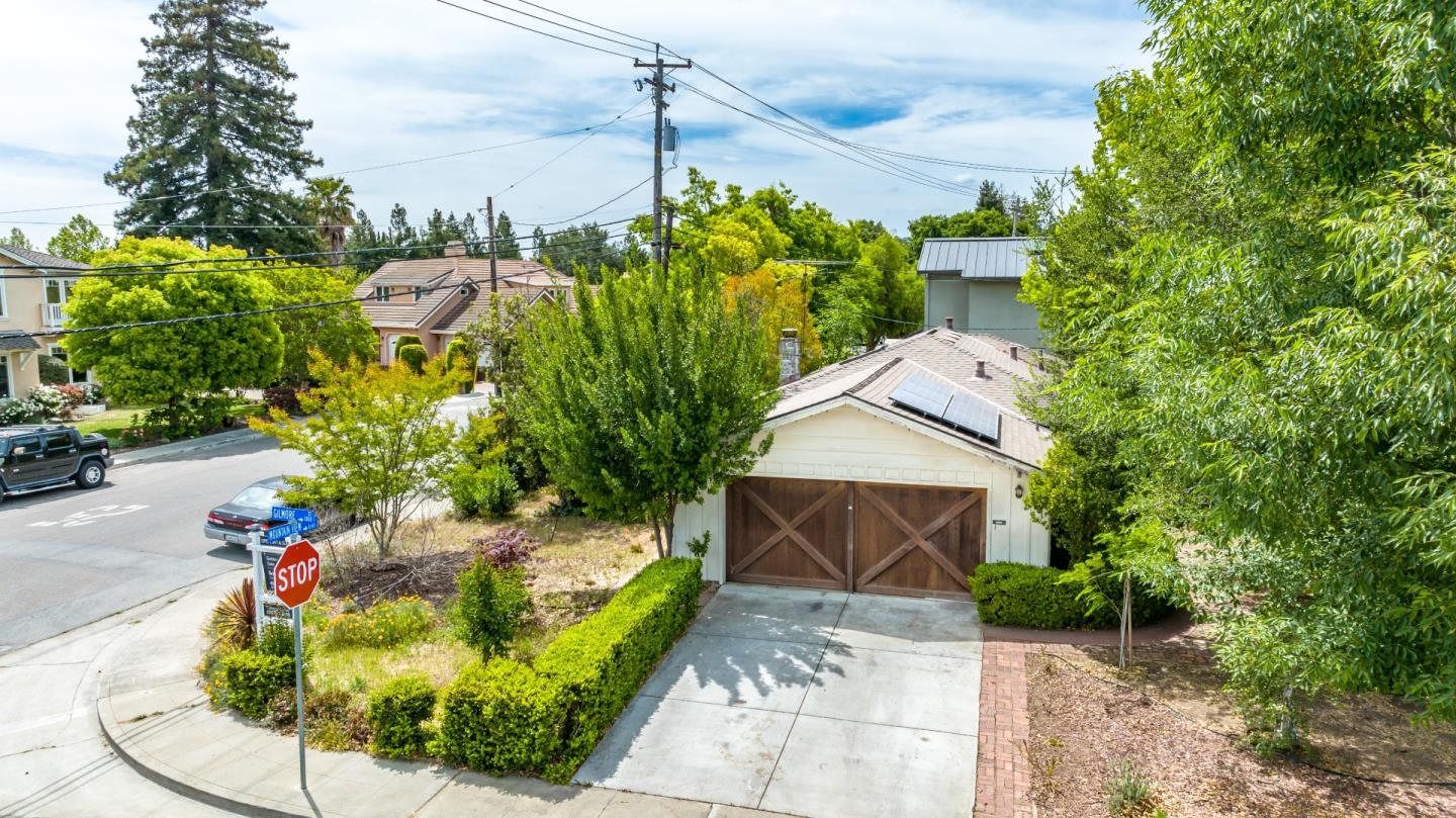 1303 Gilmore Street Mountain View, CA 94040 - Photo 2 of 12 a view of a house with a yard and potted plants