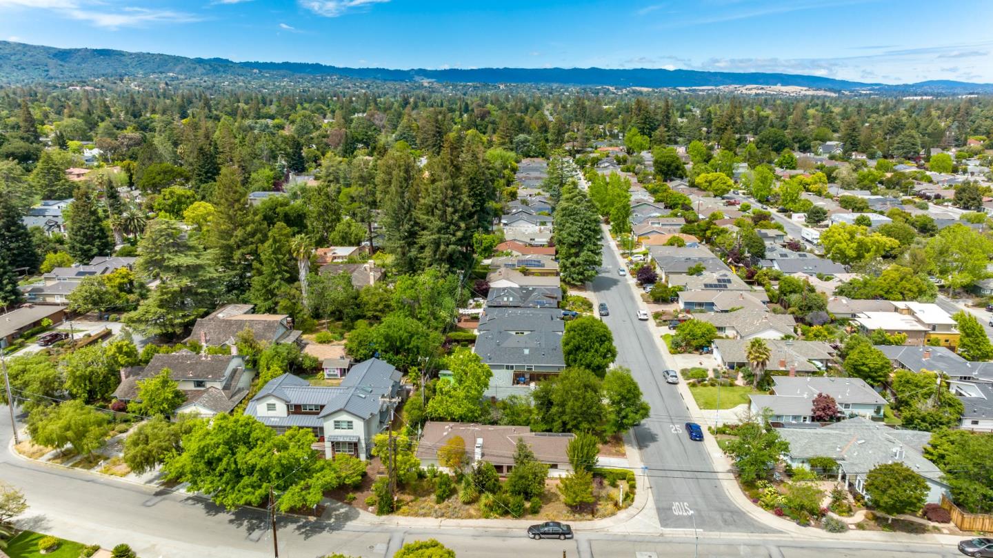 1303 Gilmore Street Mountain View, CA 94040 - Photo 5 of 12 an aerial view of residential houses with outdoor space and trees