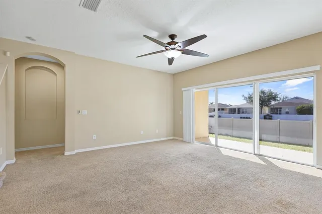 a view of an empty room with window
