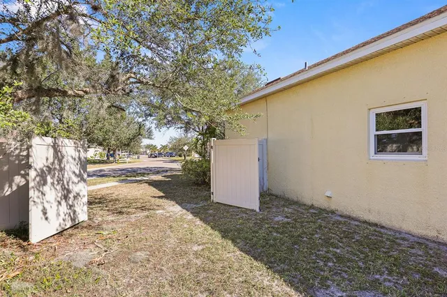 a backyard of a house with lots of green space