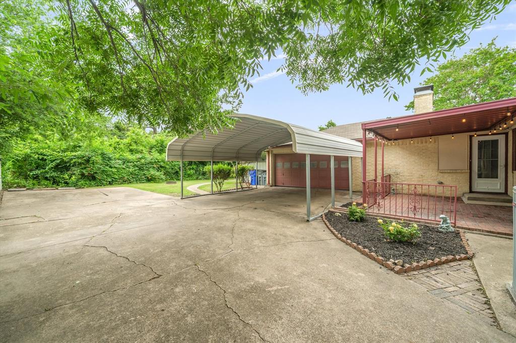 913 Pinson Road Forney, TX 75126 - Photo 17 of 19 Covered parking off of the attached garage.
