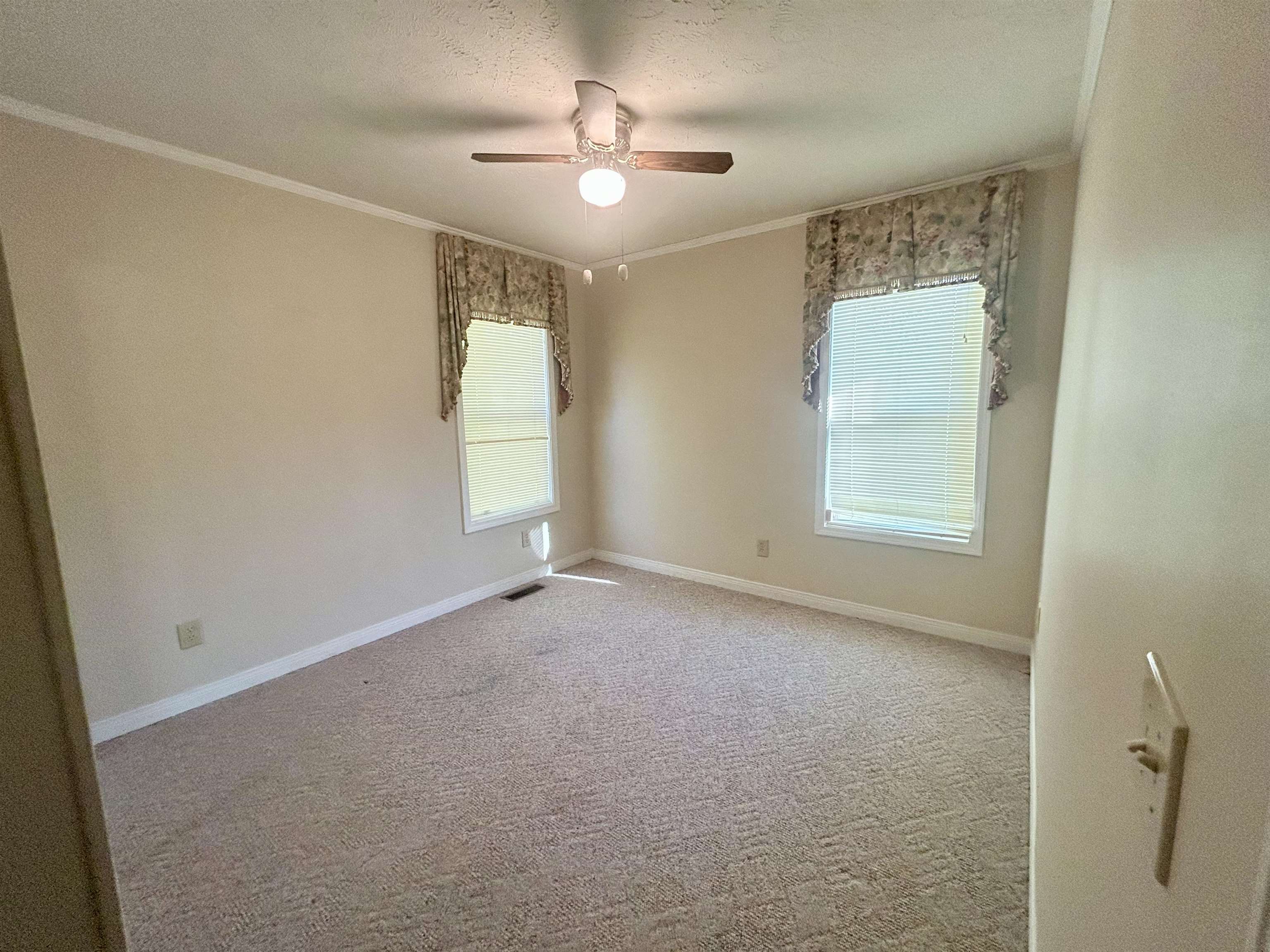 720 Riverside Lane Crump, TN 38327 - Photo 17 of 39 a view of an empty room with a window
