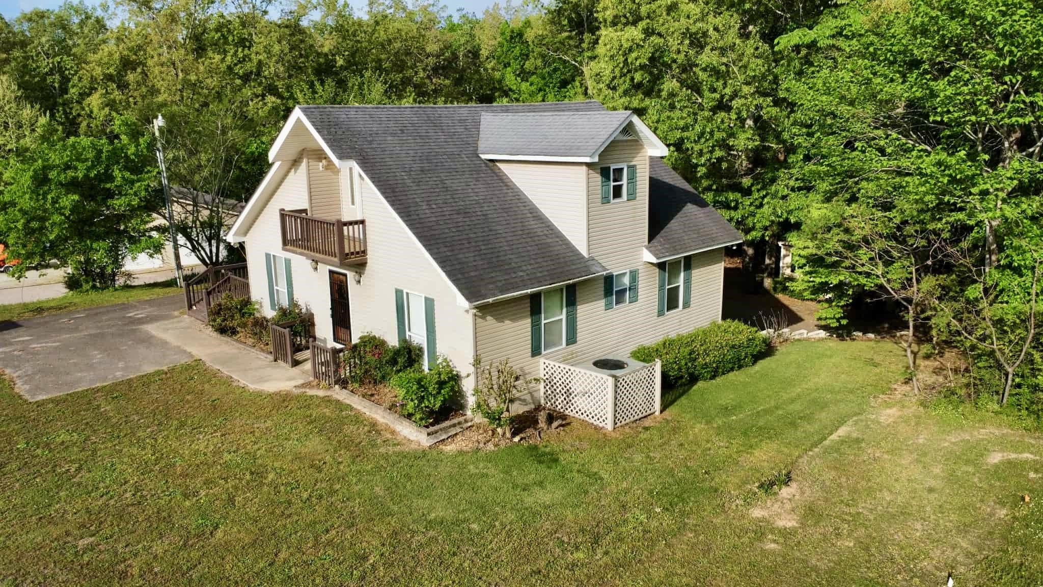 720 Riverside Lane Crump, TN 38327 - Photo 32 of 39 a view of a yard in front of house
