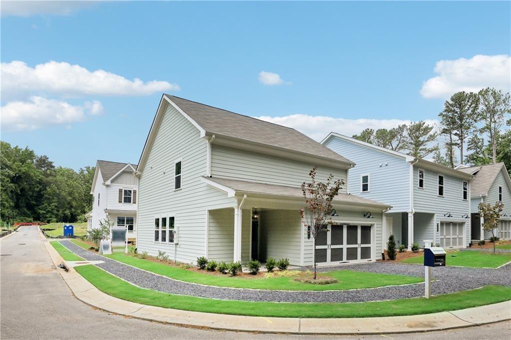 911 East Green Lane Clarkston, GA 30021 - Photo 29 of 43 a front view of a house with a yard