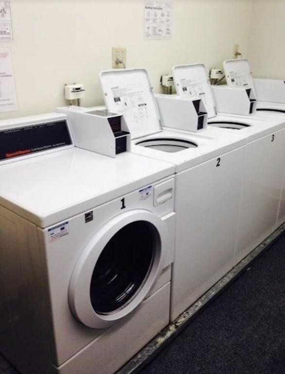 4925 Washington Street, Unit 406 Boston, MA 02132 - Photo 10 of 11 a utility room with dryer and washer