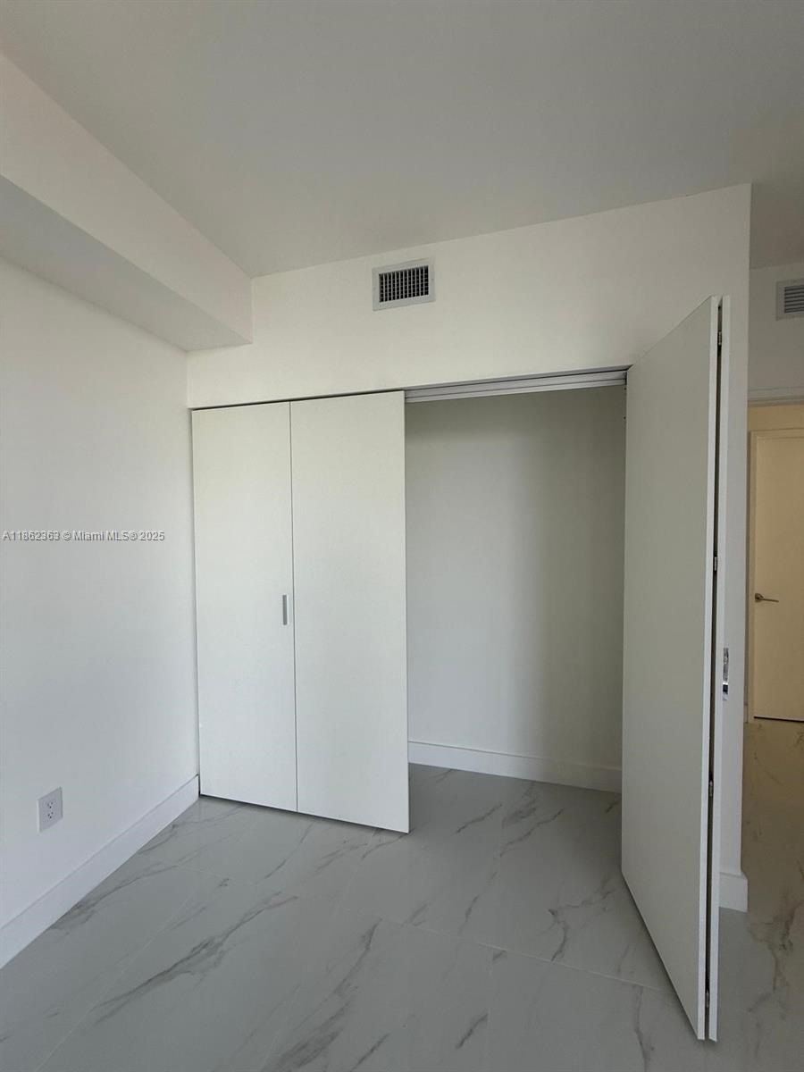 700 Northeast 24th Street, Unit 3701 Miami, FL 33137 - Photo 24 of 53 an empty room