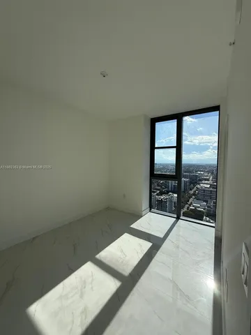 a view of a bathroom with a washer and dryer