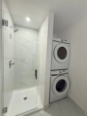 a view of a glass door and balcony