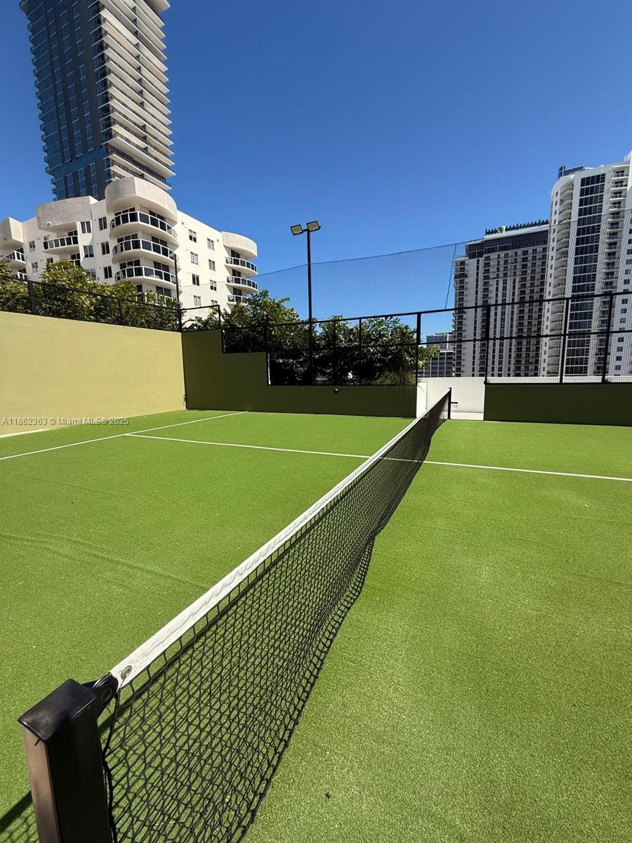 700 Northeast 24th Street, Unit 3701 Miami, FL 33137 - Photo 41 of 53 a view of a tennis court