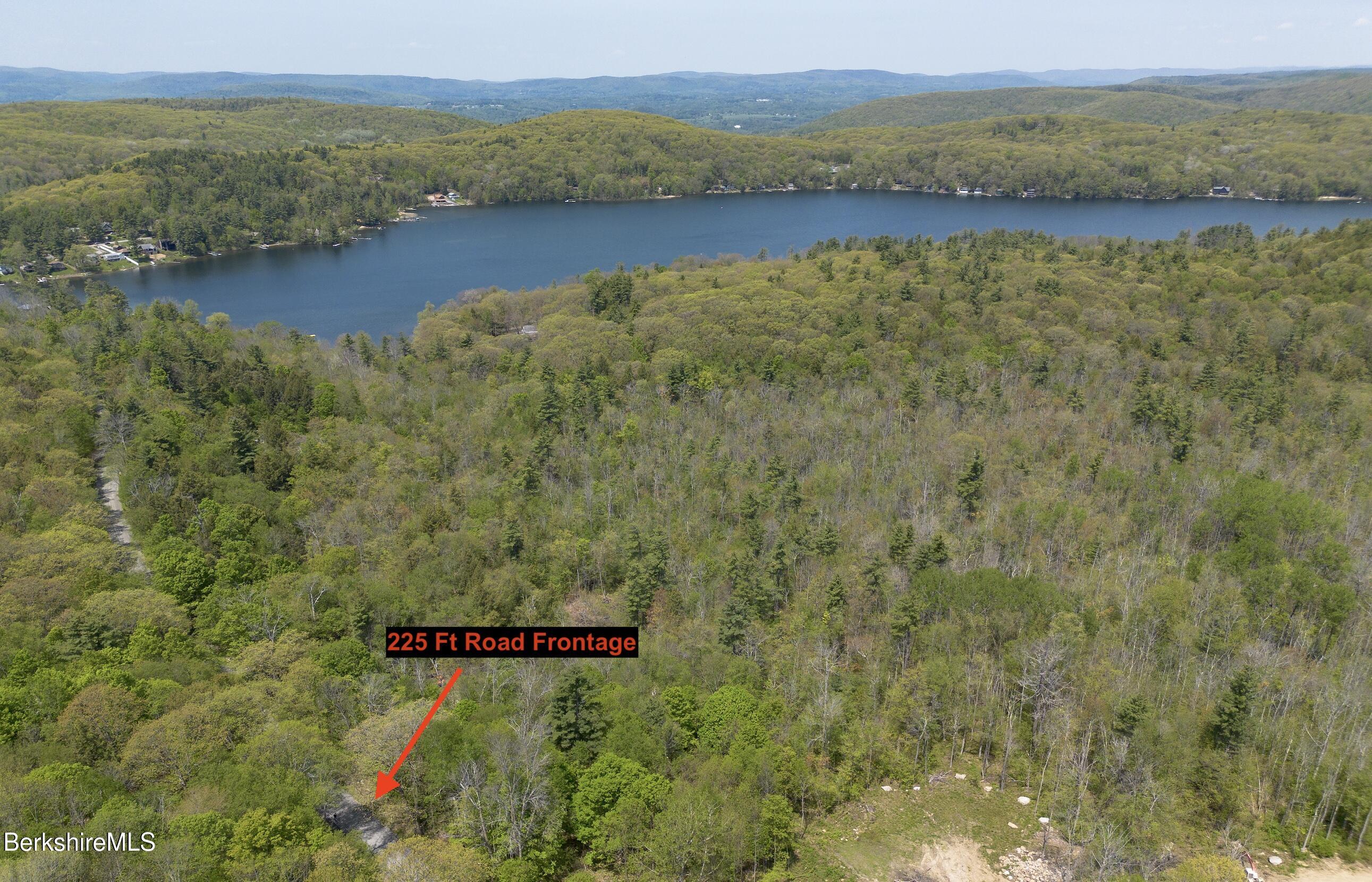 0 Goose Pond (lot Road Lee, MA 01238 - Photo 5 of 12 a view of a lake with a mountain in the back