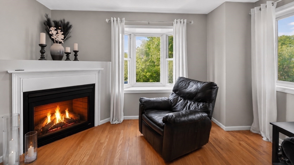5 Governors Way, Unit B Milford, MA 01757 - Photo 12 of 42 a living room with furniture and a fireplace