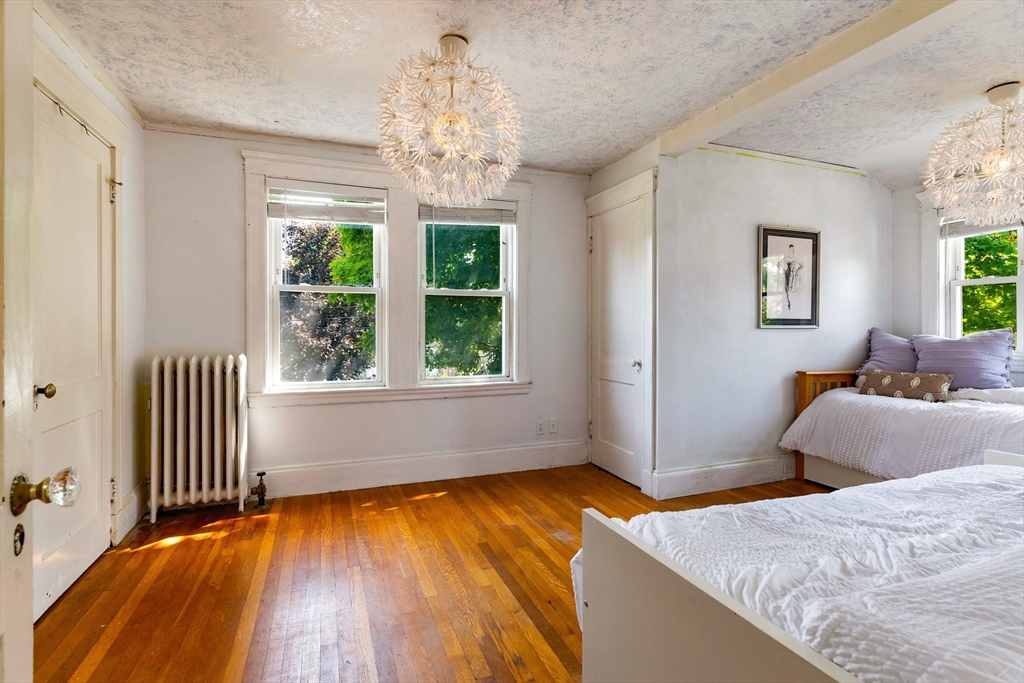 102 Gleason Road Lexington, MA 02420 - Photo 23 of 37 a bedroom with furniture and a window