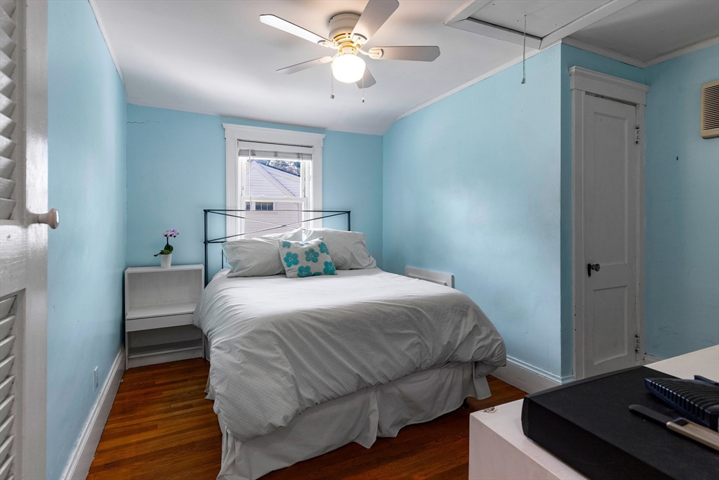 102 Gleason Road Lexington, MA 02420 - Photo 28 of 37 a bedroom with a bed and window