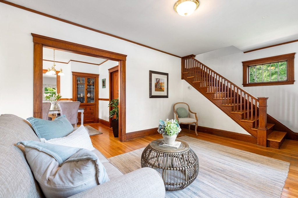 102 Gleason Road Lexington, MA 02420 - Photo 6 of 37 a living room with furniture flowerpot and wooden floor