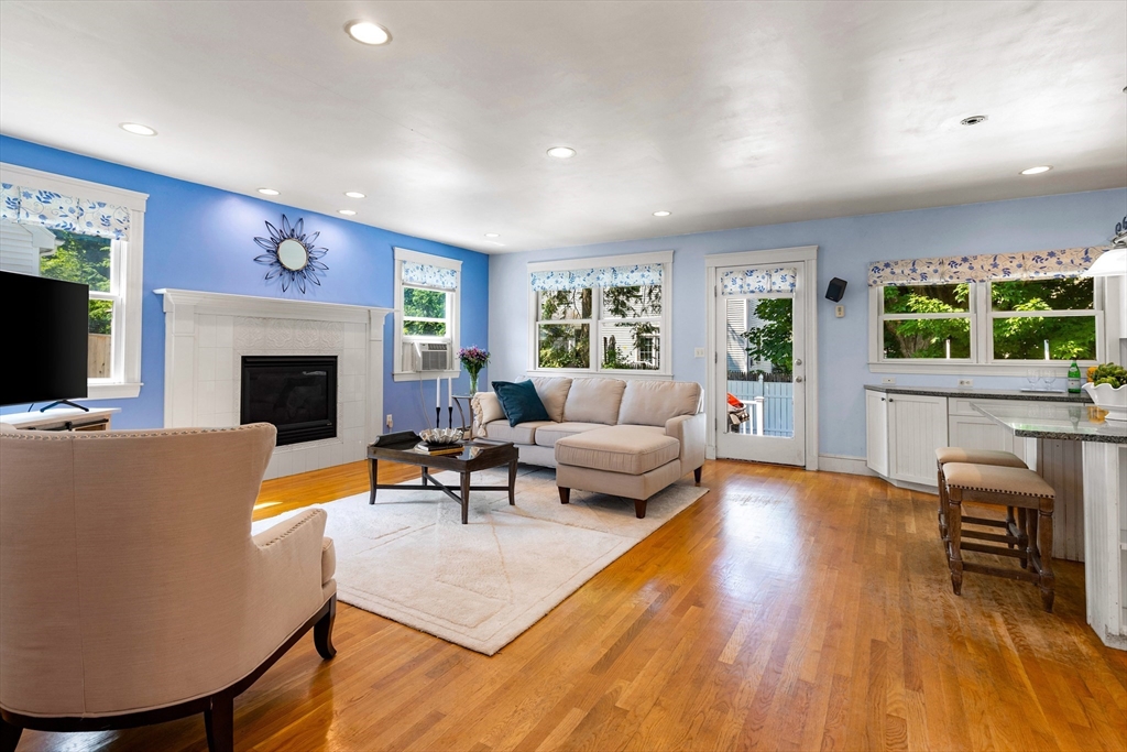 102 Gleason Road Lexington, MA 02420 - Photo 10 of 37 a living room with furniture fireplace and window