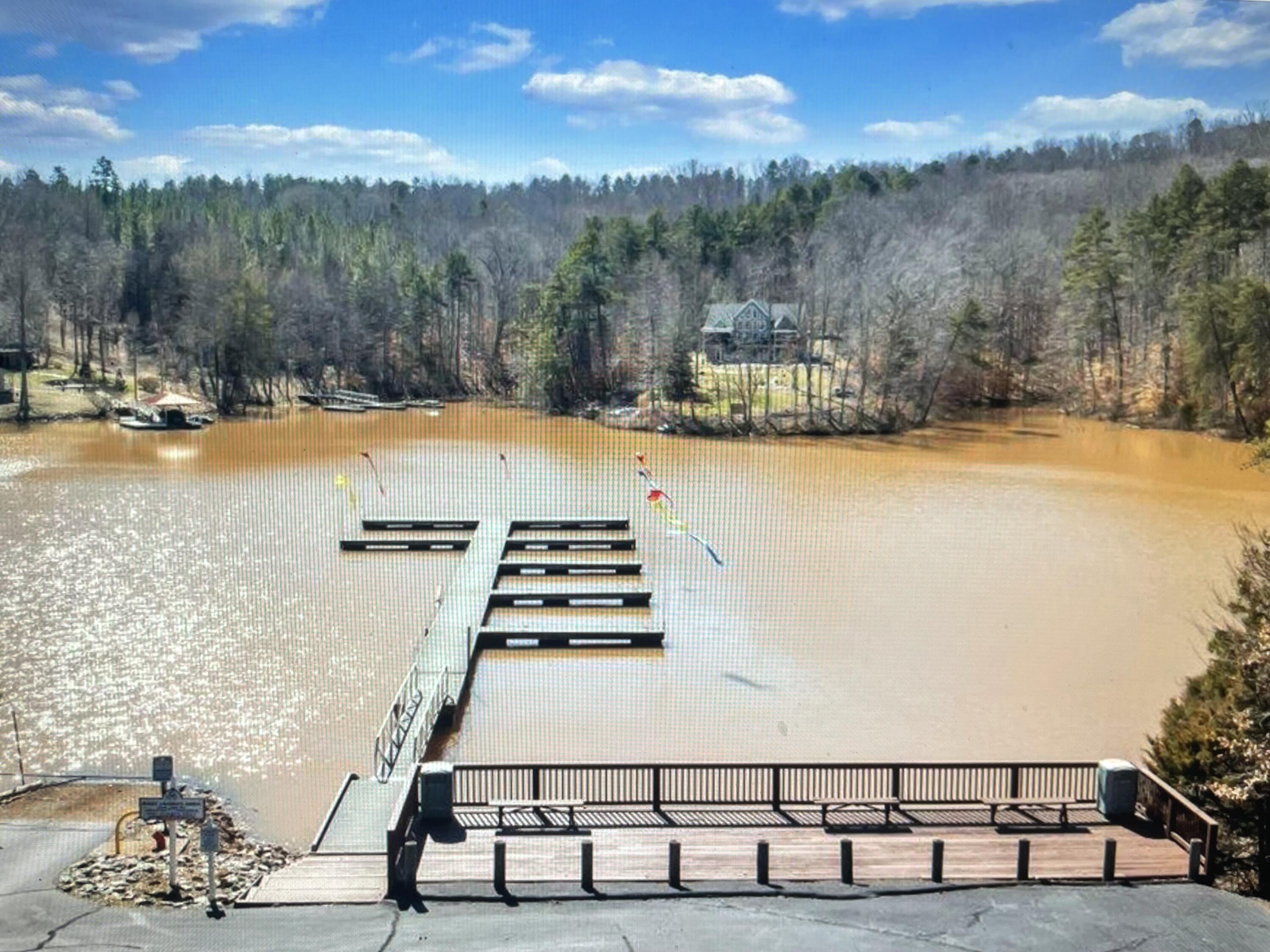 Lot 64 Runaway Bay Road Lynch Station, VA 24571 - Photo 5 of 5 a view of a swimming pool with an ocean view