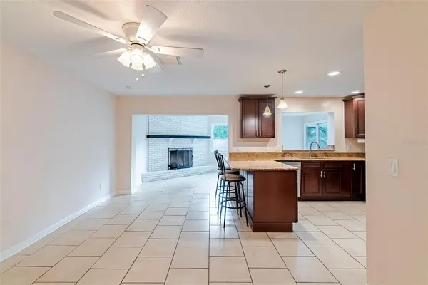 a kitchen with a sink a counter top space and appliances