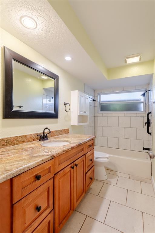 8918 134th Street North Seminole, FL 33776 - Photo 25 of 37 a bathroom with a sink a vanity and mirror