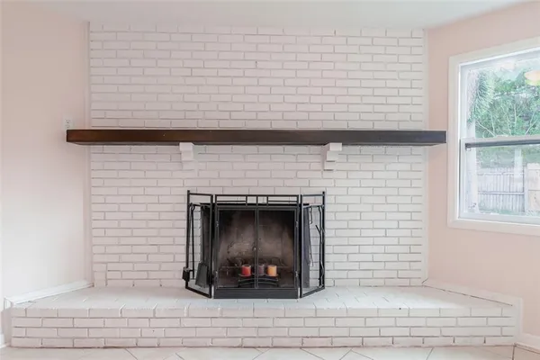 a living room with a fireplace