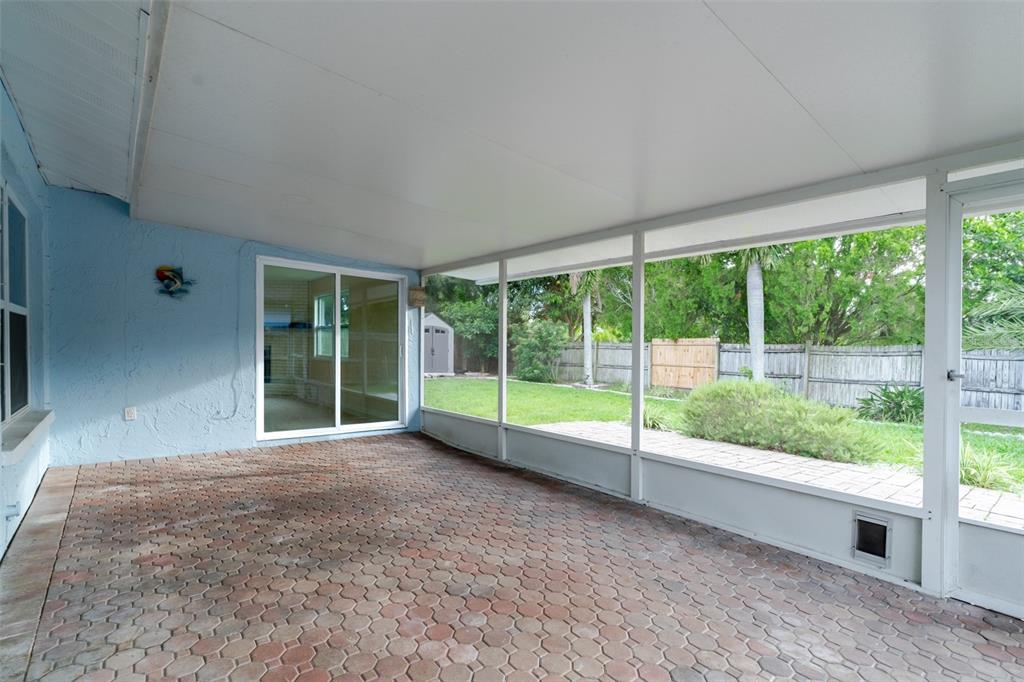 8918 134th Street North Seminole, FL 33776 - Photo 34 of 37 a view of a garden with an outdoor seating