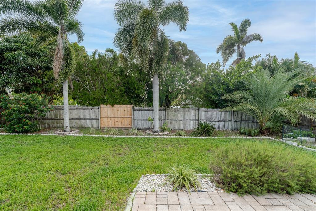 8918 134th Street North Seminole, FL 33776 - Photo 35 of 37 a house with a garden