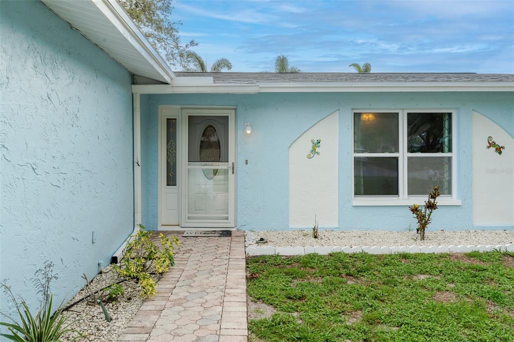 8918 134th Street North Seminole, FL 33776 - Photo 5 of 37 a view of backyard with a potted plant