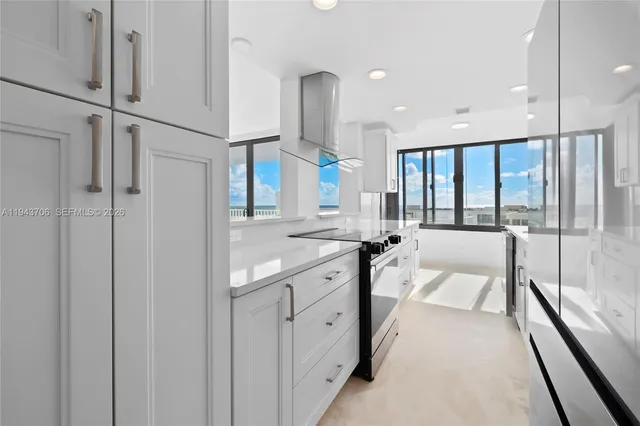 a spacious bathroom with a double vanity sink and a large mirror