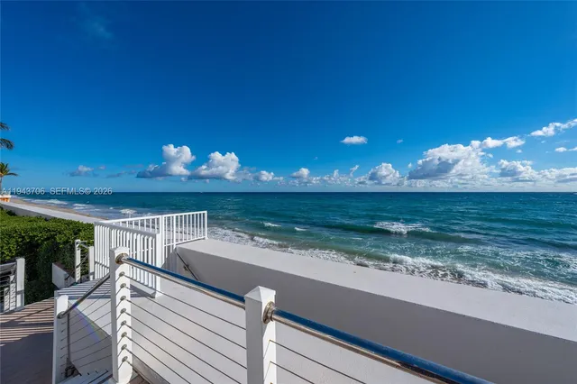 a view of swimming pool with outdoor seating
