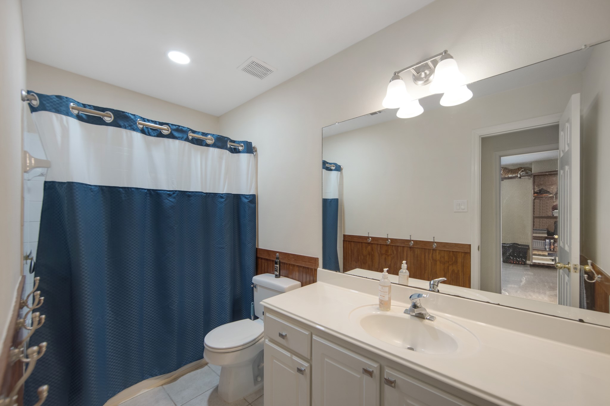 19414 Camellia Bend Circle Spring, TX 77379 - Photo 33 of 49 Secondary bathroom with tub/shower combo, plenty of towel holders and counter tops