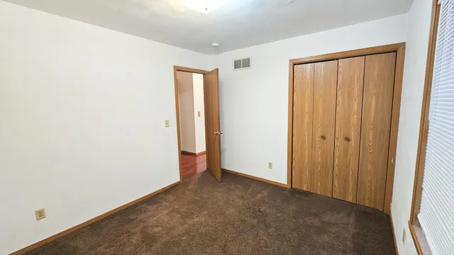 a bathroom with a toilet and a bathtub
