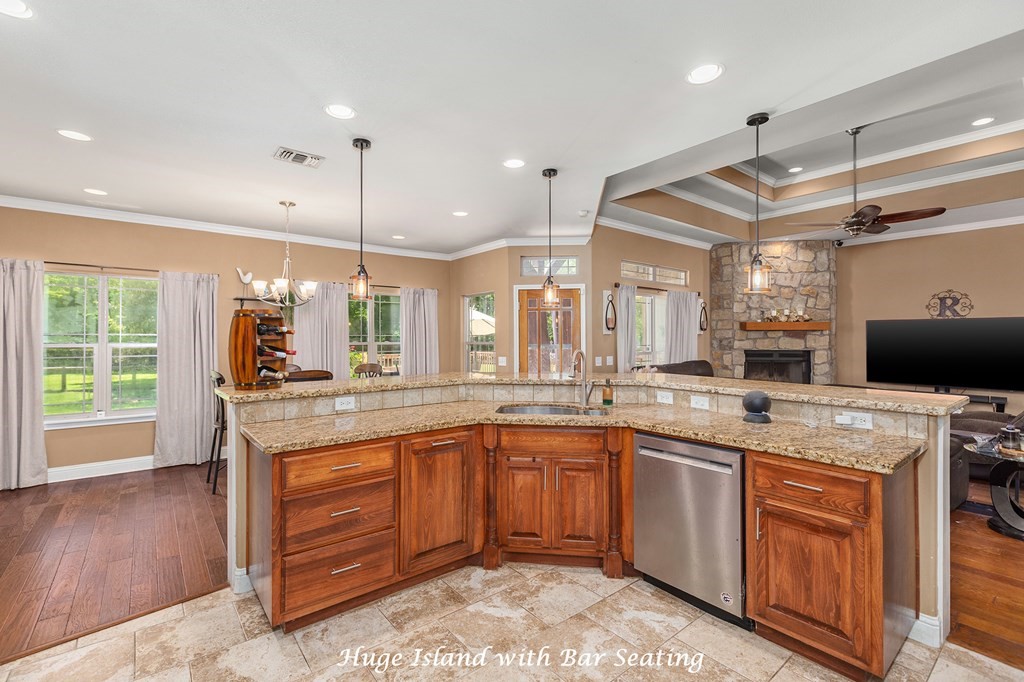 1171 Old Ewing Road Lufkin, TX 75901 - Photo 7 of 49 a kitchen with lots of counter top space and sink