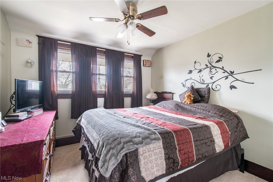 117 Morrison Street Struthers, OH 44471 - Photo 18 of 38 Bedroom featuring ceiling fan and light carpet